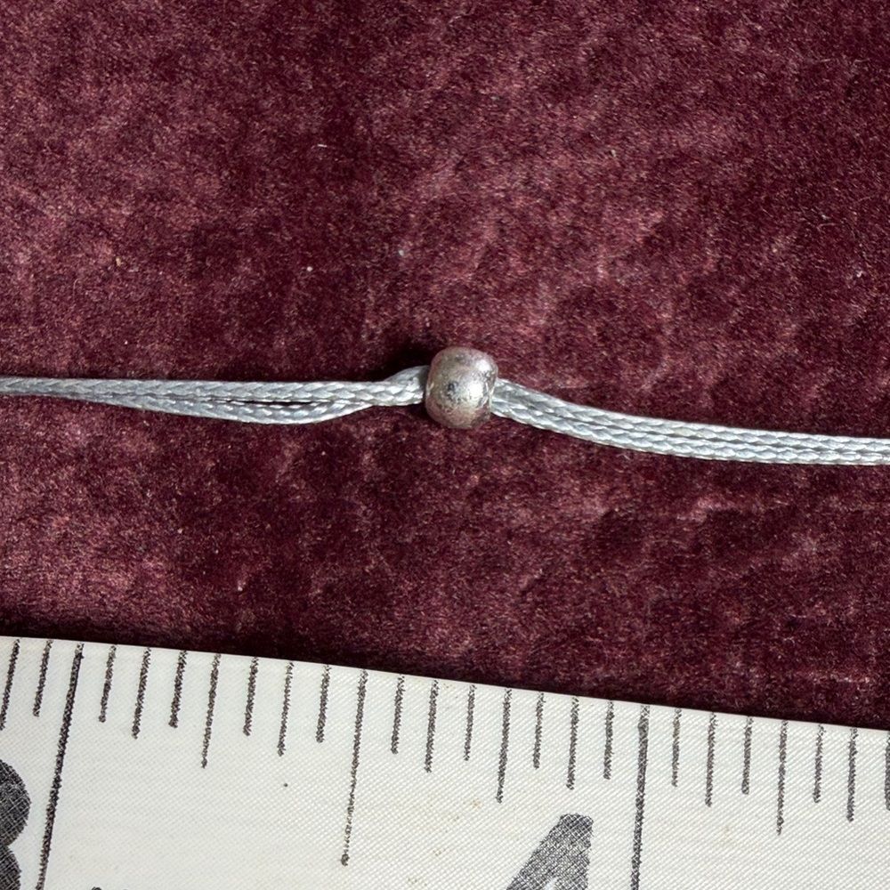 Claire's Silver Tone Beaded Cord Bracelet - Picture 8 of 8